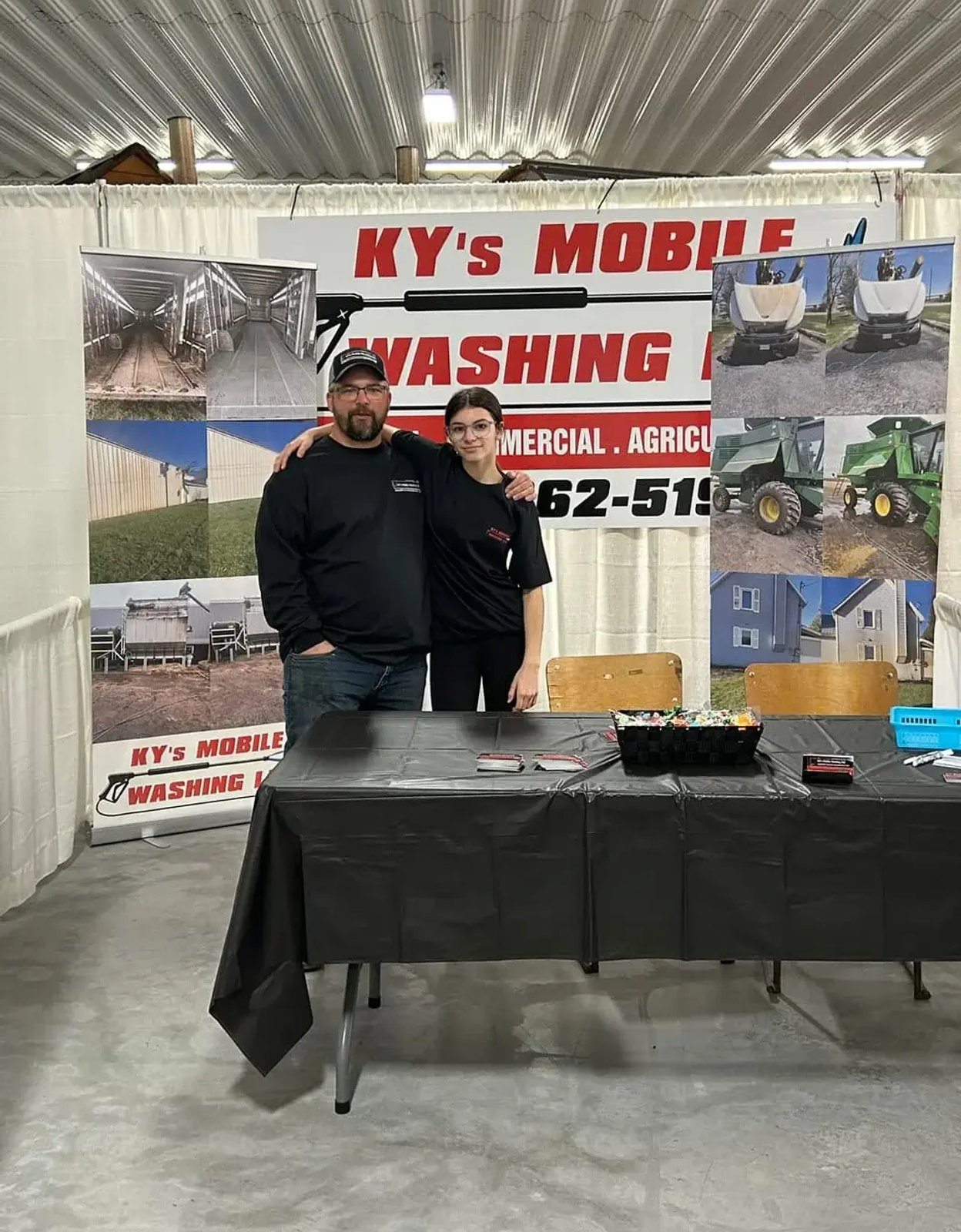 kyle at the trade show, with his daughter